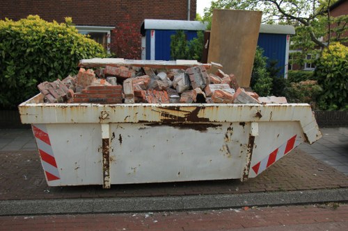 Professional team clearing office furniture in Abbey Wood